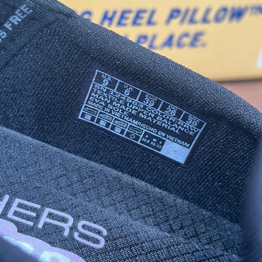 Skechers Black and White Slip-On Sneakers - Picture 6 of 11